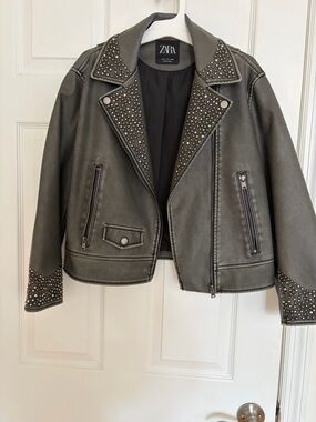 Zara black Studded Faux Leather Moto Jacket can fit women size Xs.